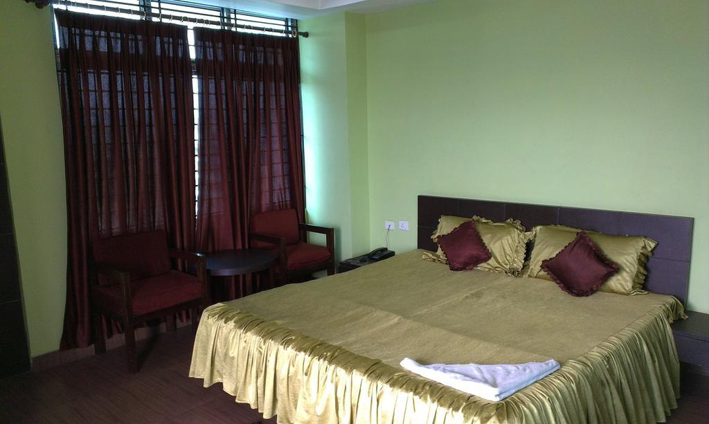 Hotel Sunview Dispur Oda fotoğraf