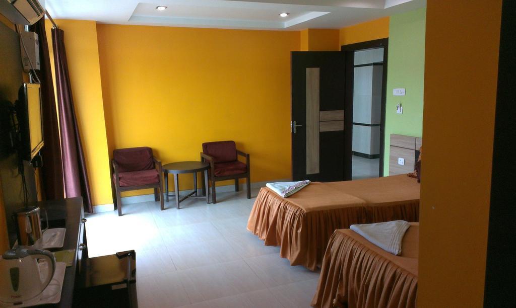 Hotel Sunview Dispur Oda fotoğraf